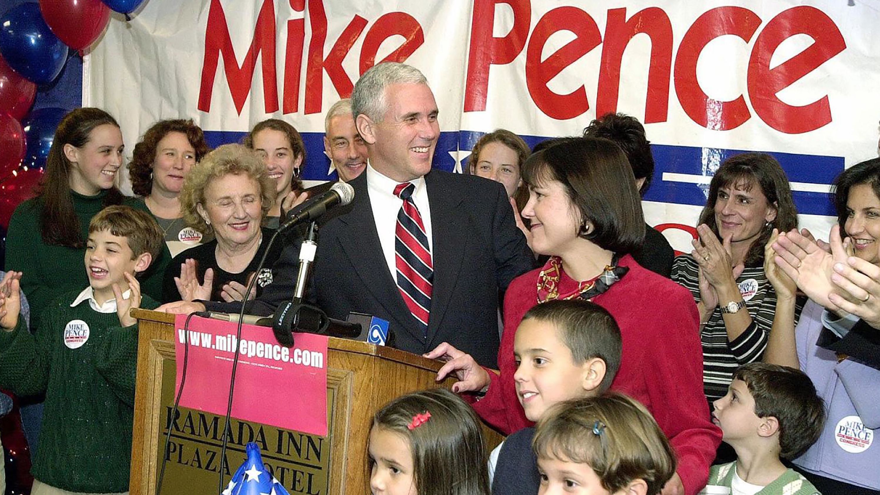Pence is joined by his wife, Karen, and other family members after winning a congressional race in 2000.