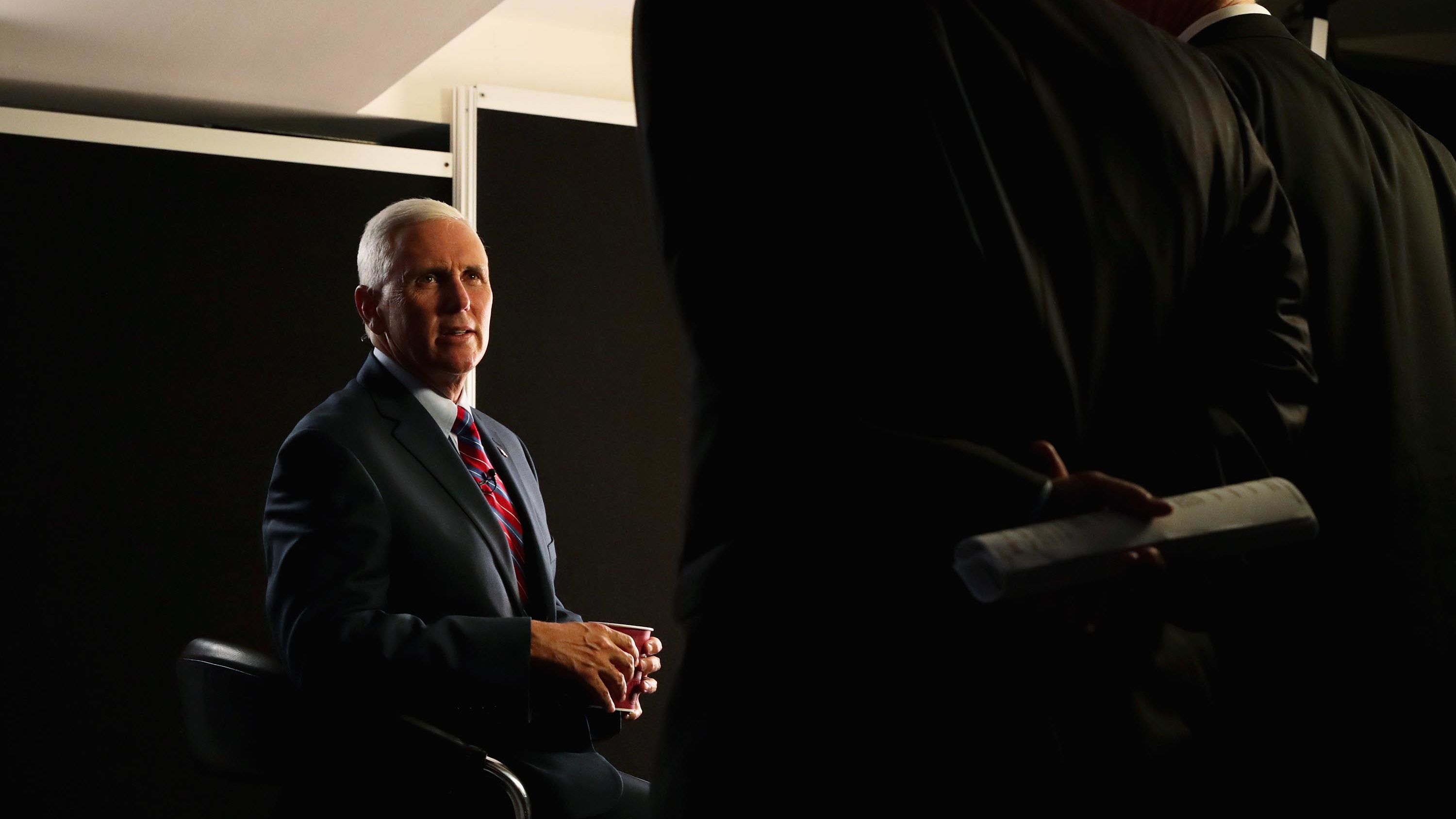 Pence prepares for an interview prior to the start of the fourth day of the Republican National Convention in July 2016.