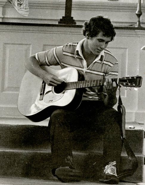A young Pence plays guitar in a Hanover College chapel. Pence graduated from the Indiana school in 1981 and then went on to study law.