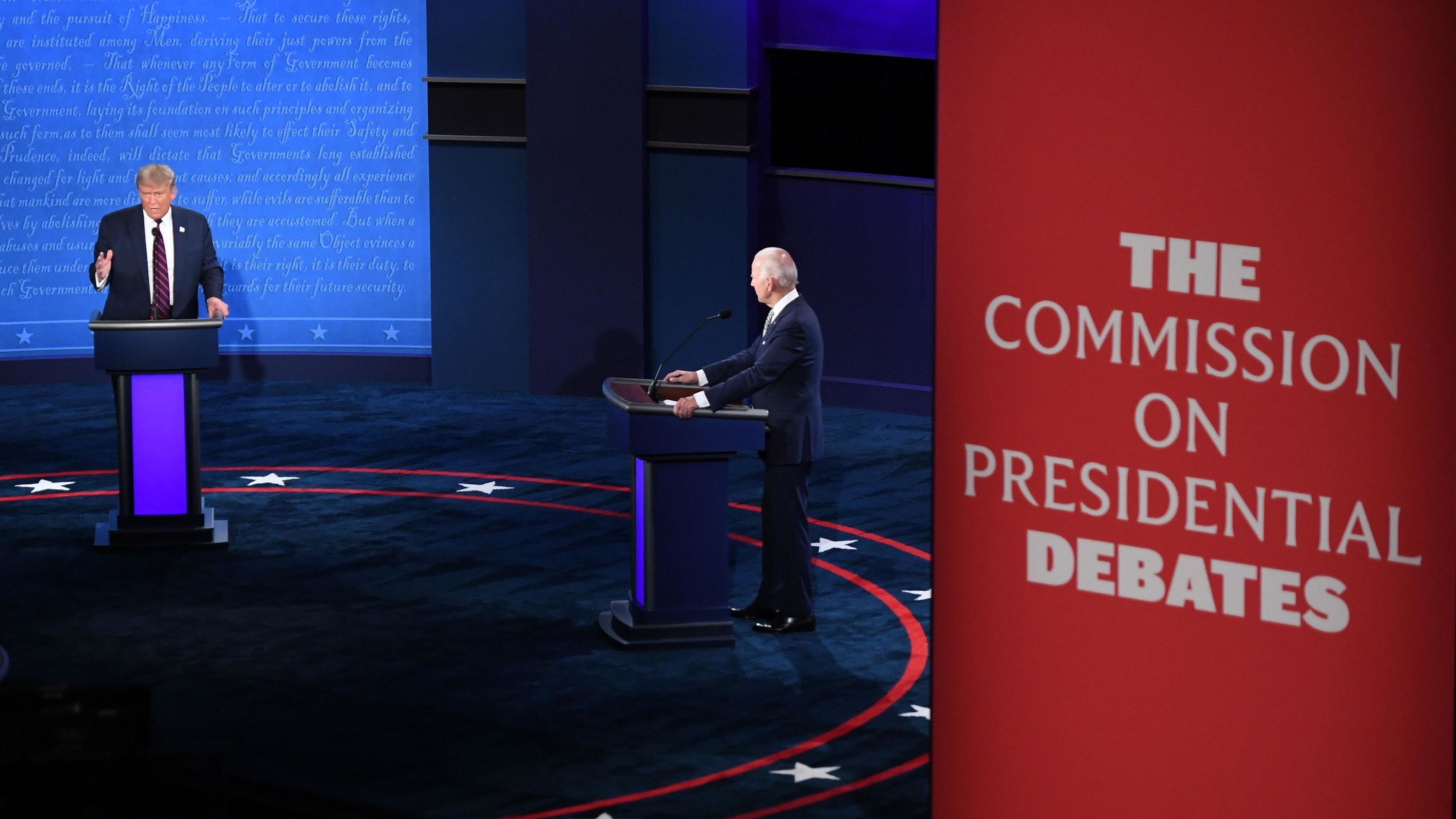 Democratic Presidential candidate and former US Vice President Joe Biden (R) and US President Donald Trump take part in the first presidential debate at Case Western Reserve University and Cleveland Clinic in Cleveland, Ohio, on September 29, 2020.
