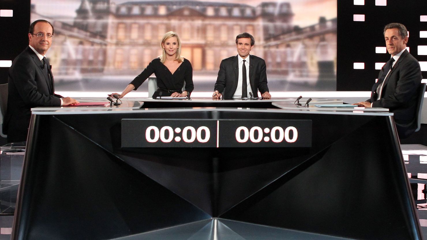 President Nicolas Sarkozy, right, faces his Socialist Party opponent Francois Hollande, left, during a televised debate in 2012. 
