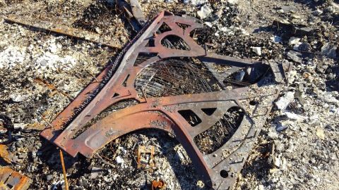 A cast iron plate and piano wire are the remnants of a century old piano once located in the Canyon Cannabis dispensary in Gates, Oregon. Canyon Cannabis was destroyed by the Beachie Creek Fire on Sept. 8, 2020.