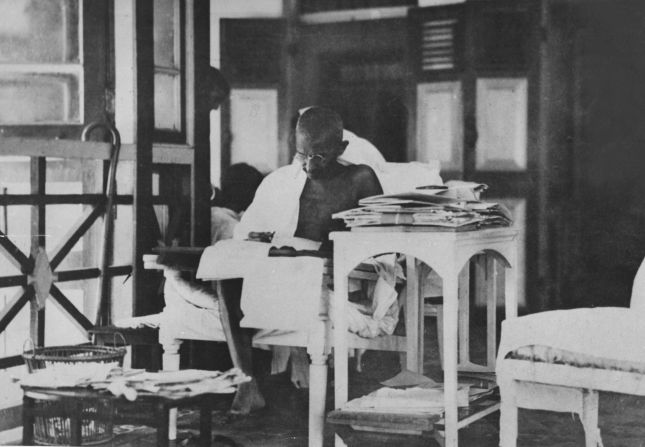 Gandhi reads letters after being released from prison in 1924. While he was leader of the Indian National Congress, he led a nonviolent campaign of resistance against colonial rule. He was arrested, charged with sedition and sentenced to six years in prison. He was released after two years.