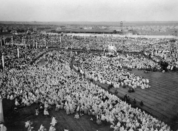 Crowds gather to hear Gandhi speak next to the Sabarmati River in India.