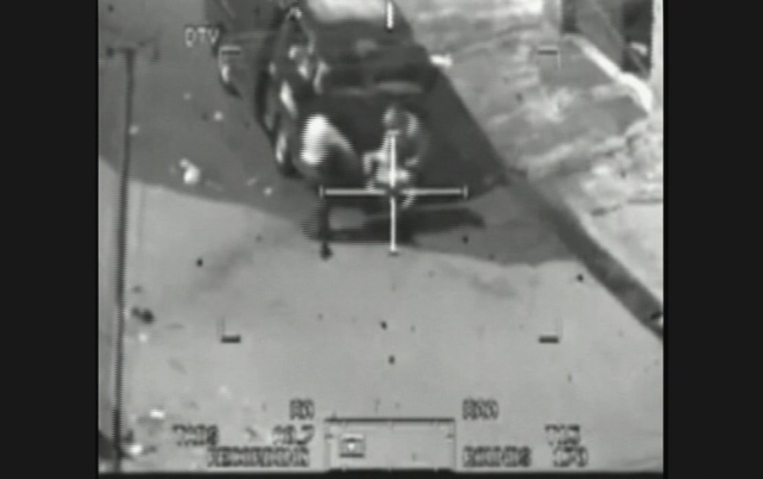 An image taken from classified US military footage shows a wounded Iraqi person being loaded onto a van during a 2007 attack by Apache helicopters, as released to Reuters on April 5, 2010 by WikiLeaks.