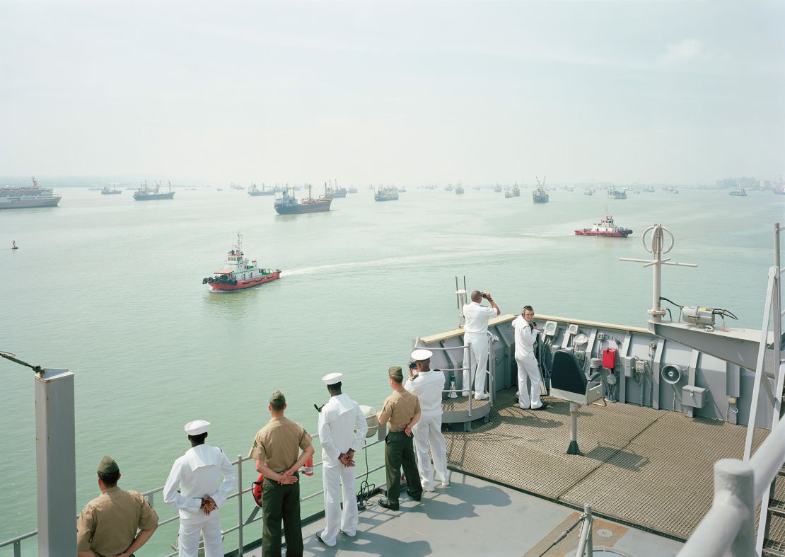 "Manning the Rail, USS Tortuga, Java Sea (2010)."
