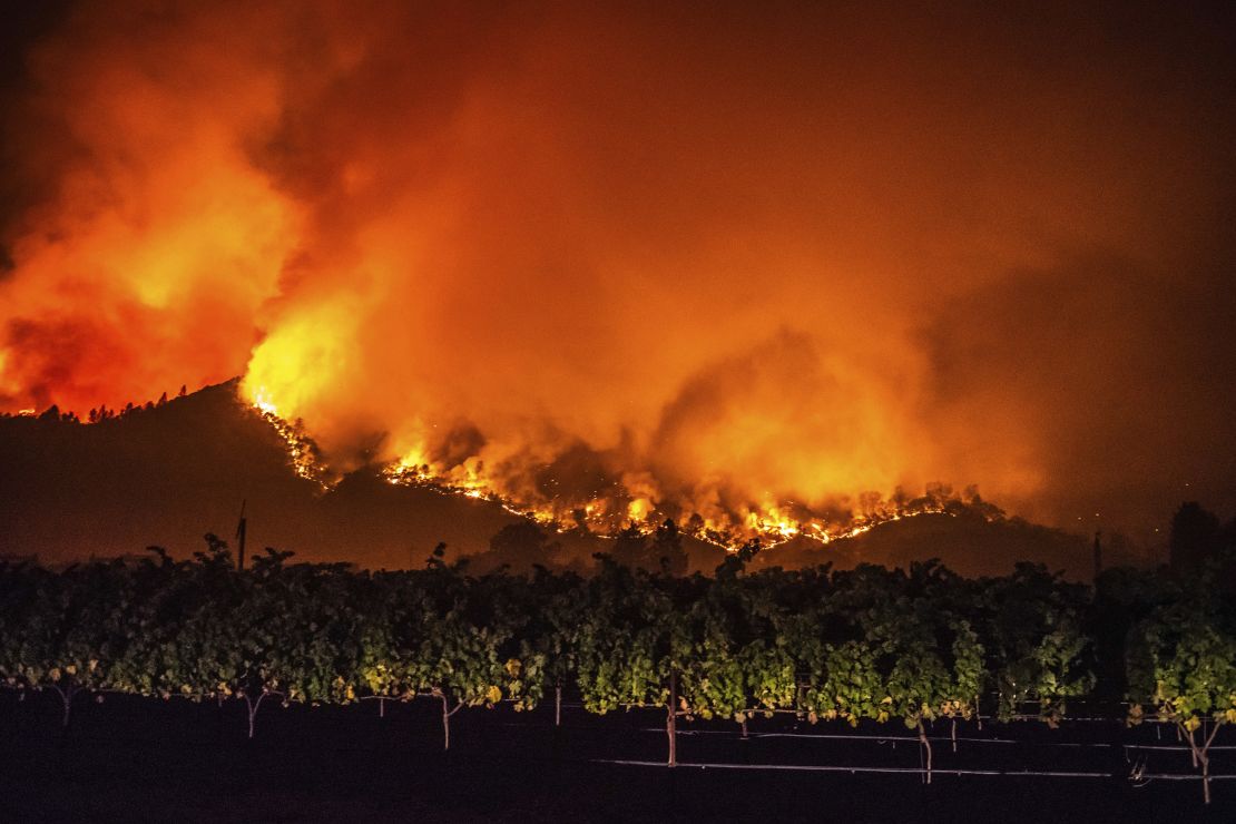 Wildfire flames from the Glass Fire Incident are seen near Calistoga, California.