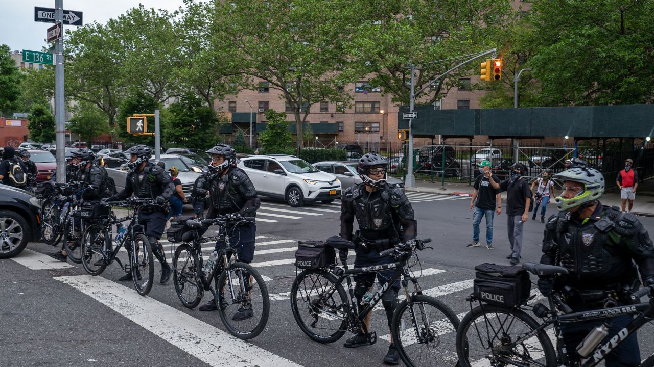 NYPD prepares to make arrest as protesters break the citywide curfew on June 4, 2020 in the Bronx borough of New York City.
