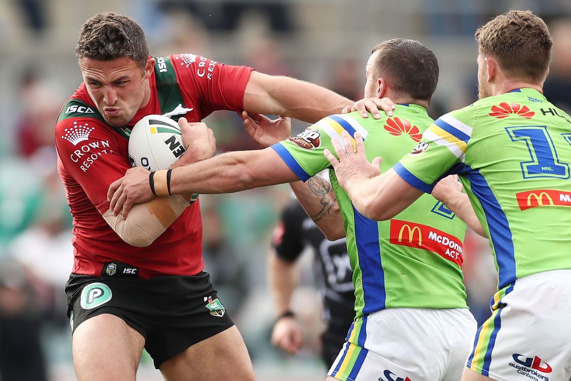 Burgess attempts to break a tackle against the Canberra Raiders in August 2018.