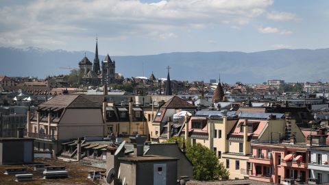 A 2019 file photo shows the St. Pierre Cathedral overlooking the roofs in the center of Geneva, Switzerland.
