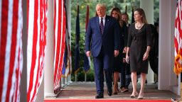 WASHINGTON, DC - SEPTEMBER 26: (L-R) President Donald Trump, first lady Melania Trump and 7th U.S. Circuit Court Judge Amy Coney Barrett, 48, walk into the Rose Garden before Trump announces Barrett as his nominee to the Supreme Court at the White House September 26, 2020 in Washington, DC. With 38 days until the election, Trump tapped Barrett to be his third Supreme Court nominee in just four years and to replace the late Associate Justice Ruth Bader Ginsburg, who will be buried at Arlington National Cemetery on Tuesday. (Photo by Chip Somodevilla/Getty Images)