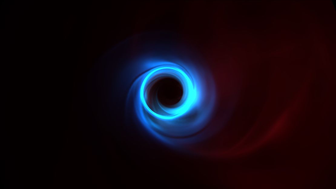 This is a simulation of M87's black hole showing the motion of plasma as it swirls around the black hole. The bright thin ring that can be seen in blue is the edge of what researchers call the black hole shadow.