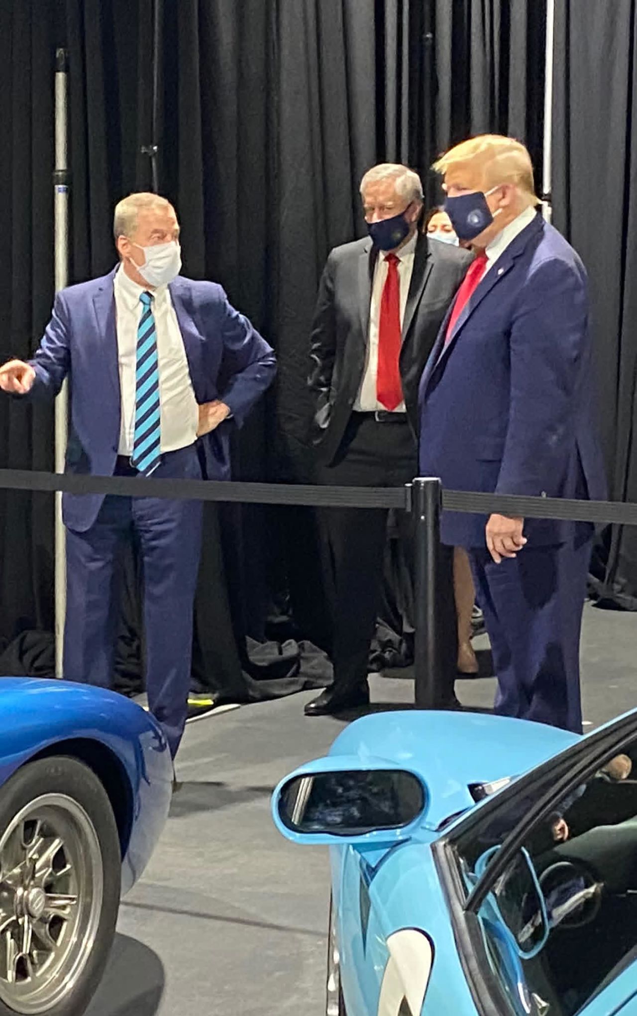 Trump wears a face mask while visiting a Ford plant in Ypsilanti, Michigan, in May 2020. But it was during a part of the tour where reporters were not allowed. "I didn't want to give the press the pleasure of seeing it," he said. This photo was tweeted by US Rep. Jackie Speier. Press photos from the tour showed Trump without a mask.