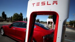 A Tesla car sits parked at a Tesla Supercharger on September 23, 2020 in Petaluma, California. California Gov. Gavin Newsom signed an executive order directing the California Air Resources Board to establish regulations that would require all new cars and passenger trucks sold in the state to be zero-emission vehicles by 2035. Sales of internal combustion engines would be banned in the state after 2035. (Photo by Justin Sullivan/Getty Images)