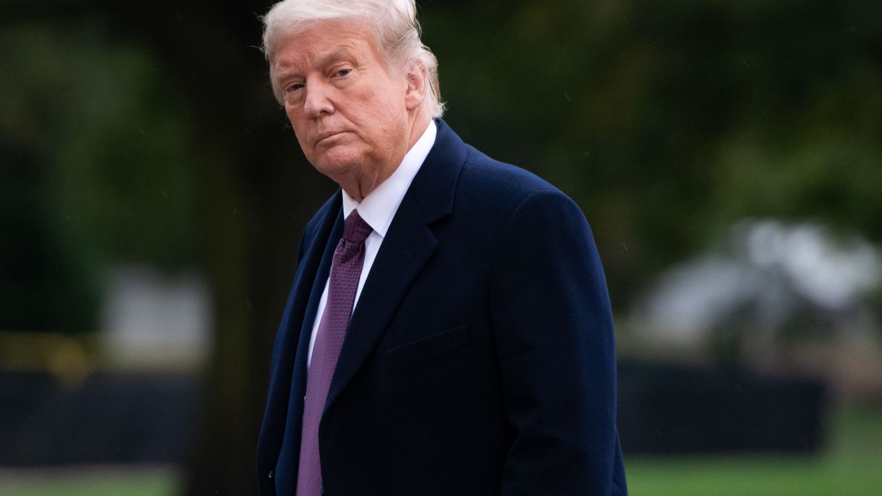 US President Donald Trump walks from Marine One after arriving on the South Lawn of the White House in Washington, DC, October 1, 2020, following campaign events in New Jersey. - White House Chief of Staff Mark Meadows said on October 1, 2020, that he was optimistic about a rapid recovery for the president as he confirmed that Trump has "mild symptoms" after testing positive for Covid-19. "The president and the First Lady... remain in good spirits," Meadows told reporters. (Photo by SAUL LOEB / AFP) (Photo by SAUL LOEB/AFP via Getty Images)