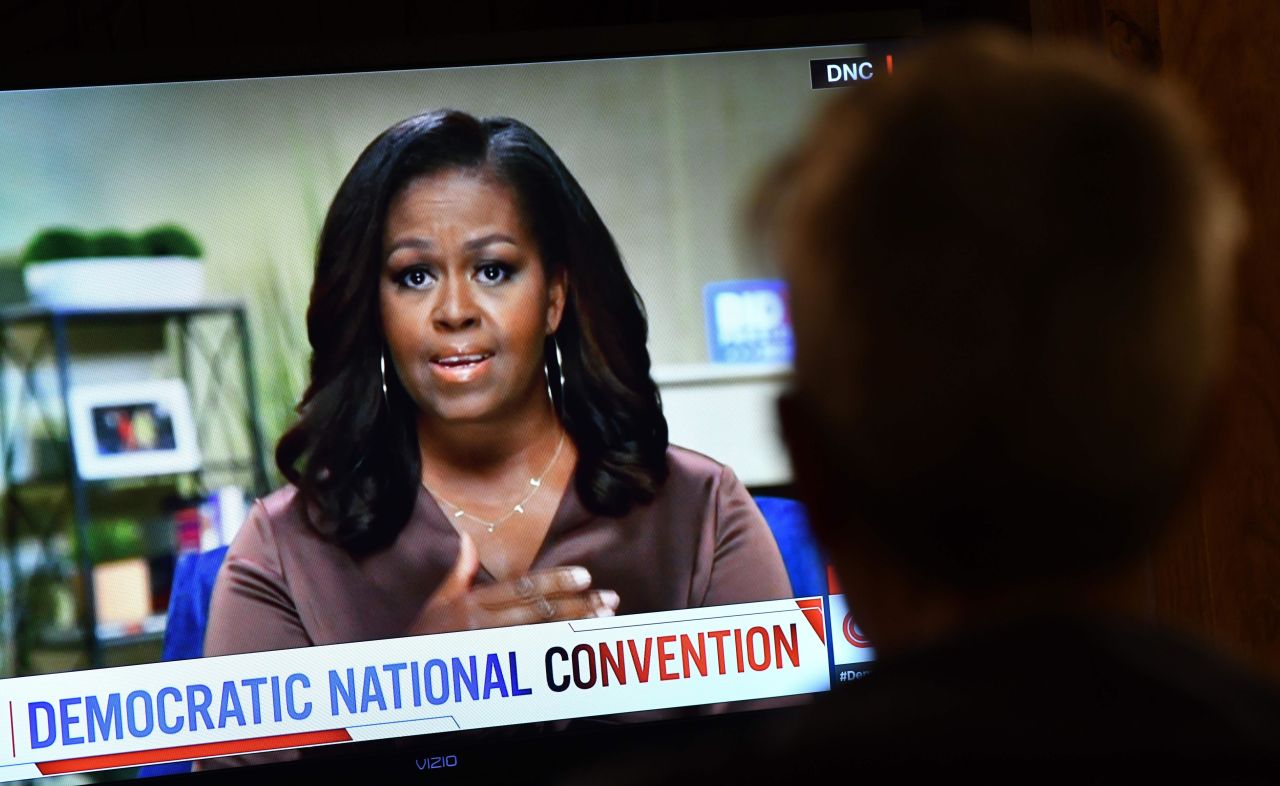 A viewer watches the former first lady speak during the 2020 Democratic National Convention, which was held virtually due to the coronavirus pandemic.