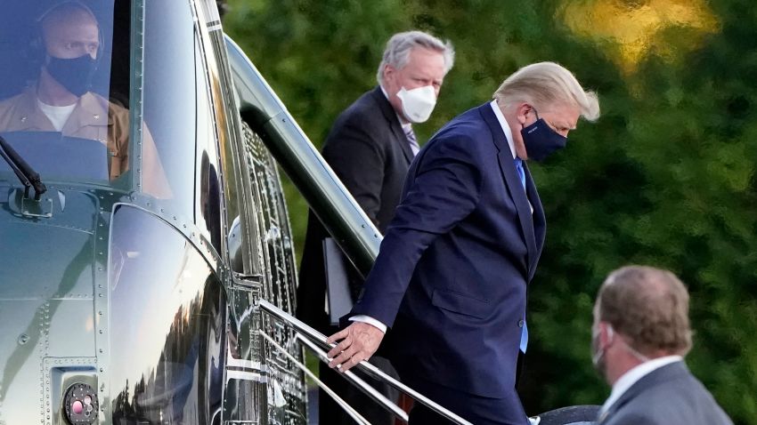 President Donald Trump arrives at Walter Reed National Military Medical Center, in Bethesda, Md., Friday, Oct. 2, 2020, on Marine One helicopter after he tested positive for COVID-19. White House chief of staff Mark Meadows is at second from left. (AP Photo/Jacquelyn Martin)