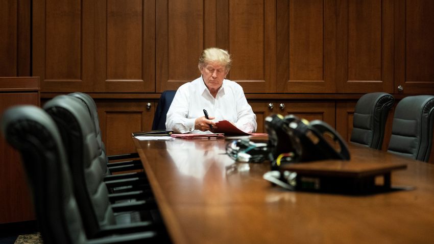 President Donald J. Trump works in his conference room at Walter Reed National Military Medical Center in Bethesda, Md. Saturday, Oct. 3, 2020, after testing positive for COVID-19.