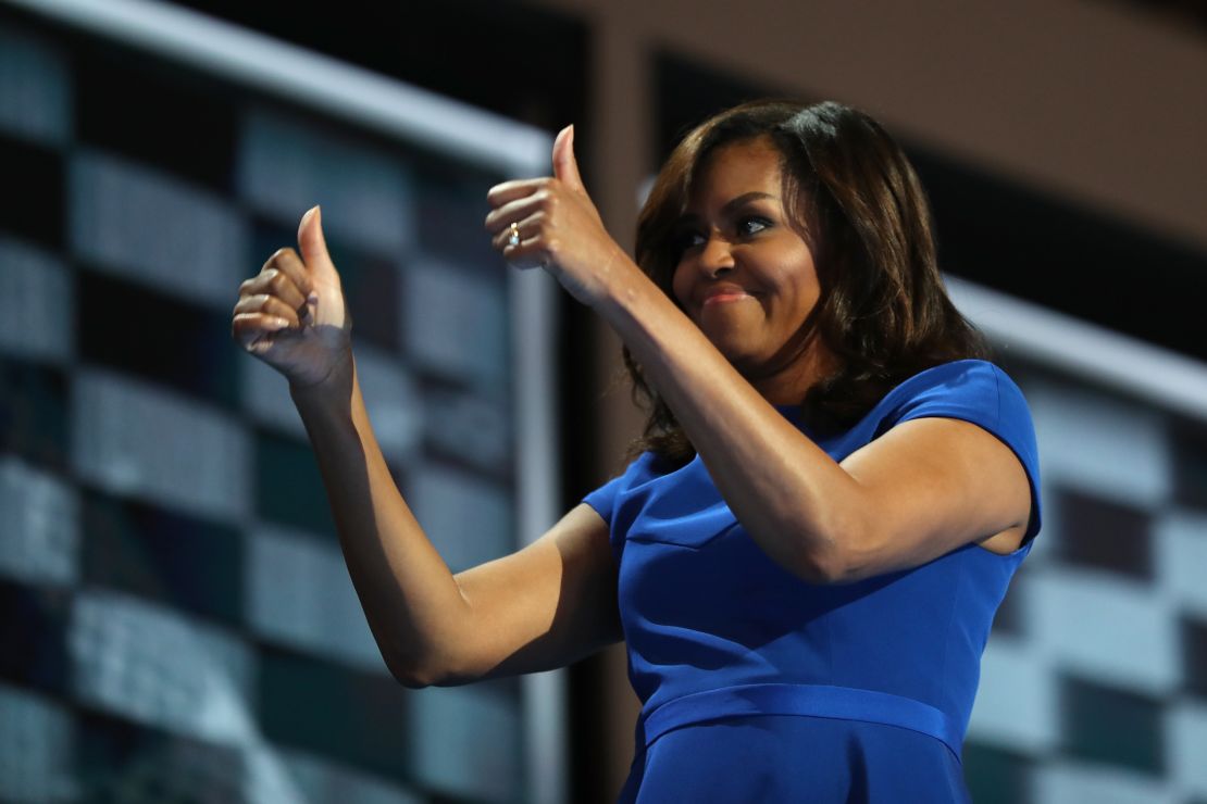 Michelle Obama gives two thumbs up at the 2016 Democratic National Convention.