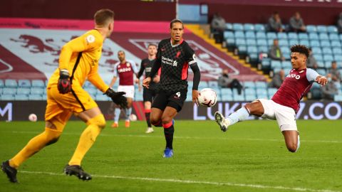 Ollie Watkins hits the bar as he searches for his fourth goal against Liverpool.