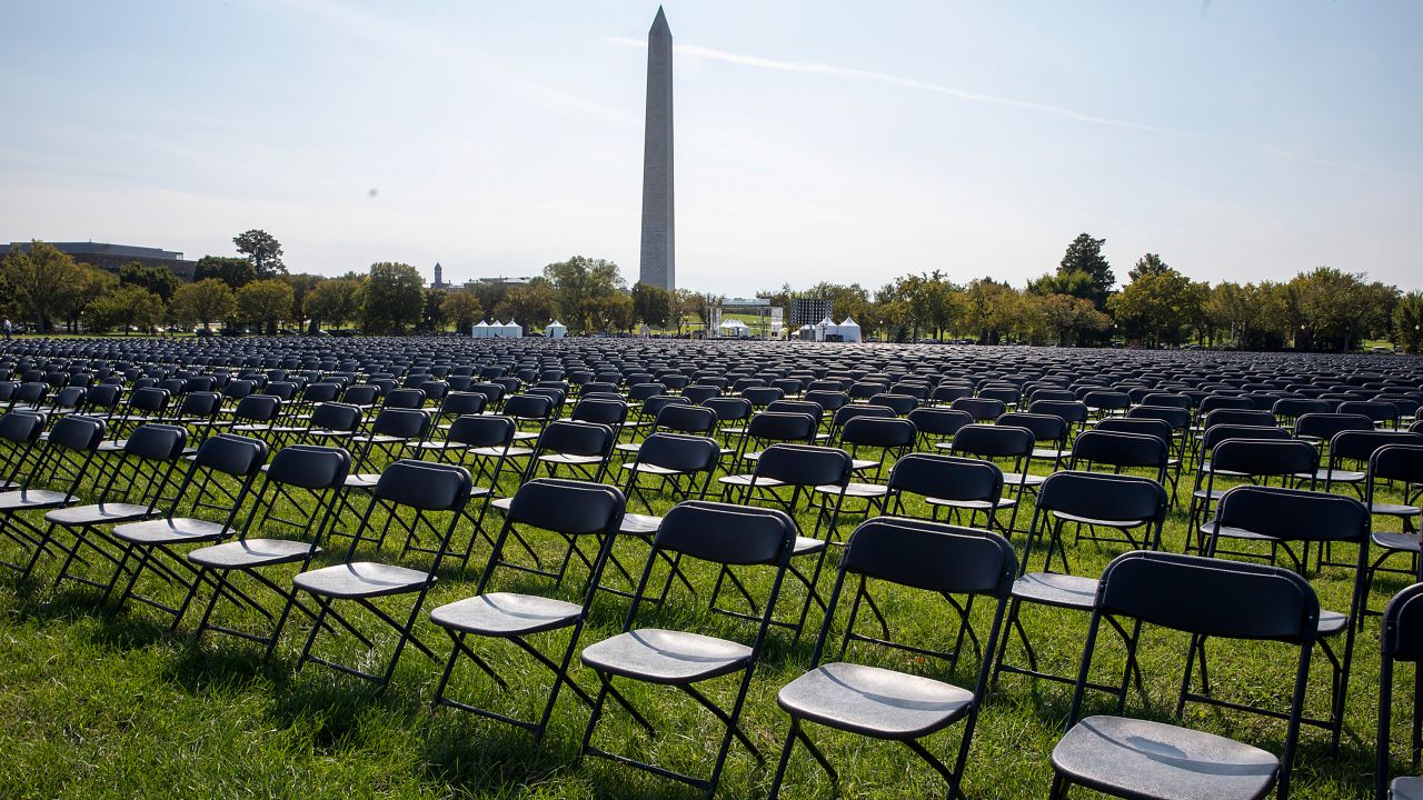 Covid Survivors for Change, a network of coronavirus survivors and victims' families, set up 20,000 empty chairs on the lawn facing the White House to represent the 200,000 people who've died from coronavirus in the US. 