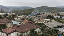 STEPANAKERT, NAGORNO-KARABAKH - OCTOBER 4: After a morning of heavy attacks, smoke rises on October 4, 2020 in Stepanakert, Nagorno-Karabakh. A decades-old conflict between Armenia and Azerbaijan has reignited in the disputed region of Nagorno-Karabakh, recognized by most countries as part of Azerbaijan, but controlled by ethnic Armenians since a 1994 ceasefire. Dozens have been reported killed in the recent fighting, in which both countries blame the other for the escalation. European leaders have pressed for a cessation of violence, concerned that the conflict may draw in foreign powers like Russia, which traditionally backs Armenia, and Turkey, which supports Azerbaijan. (Photo by Brendan Hoffman/Getty Images)