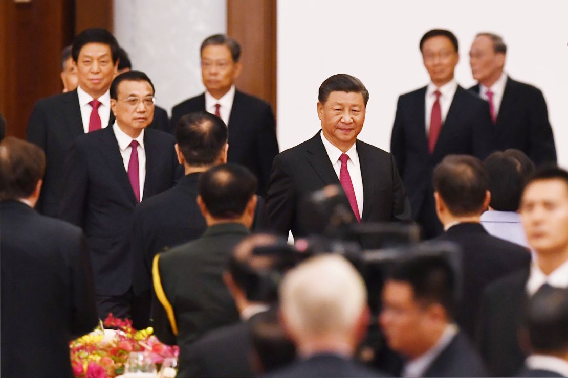 Chinese President Xi Jinping arrives for a reception at the Great Hall of the People on the eve of China's National Day on September 30.