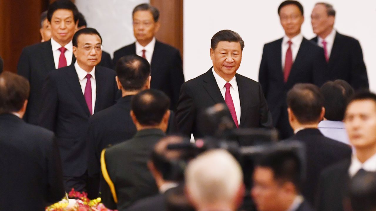 Chinese President Xi Jinping arrives for a reception at the Great Hall of the People on the eve of China's National Day on September 30.
