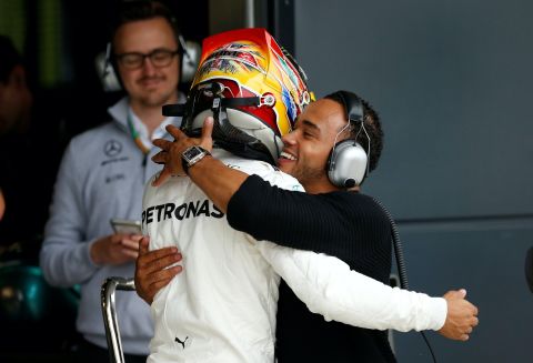 As a child, Hamilton spent time around race tracks with his brother. He says growing up in Lewis's shadow was not easy, but it has given him a platform. 