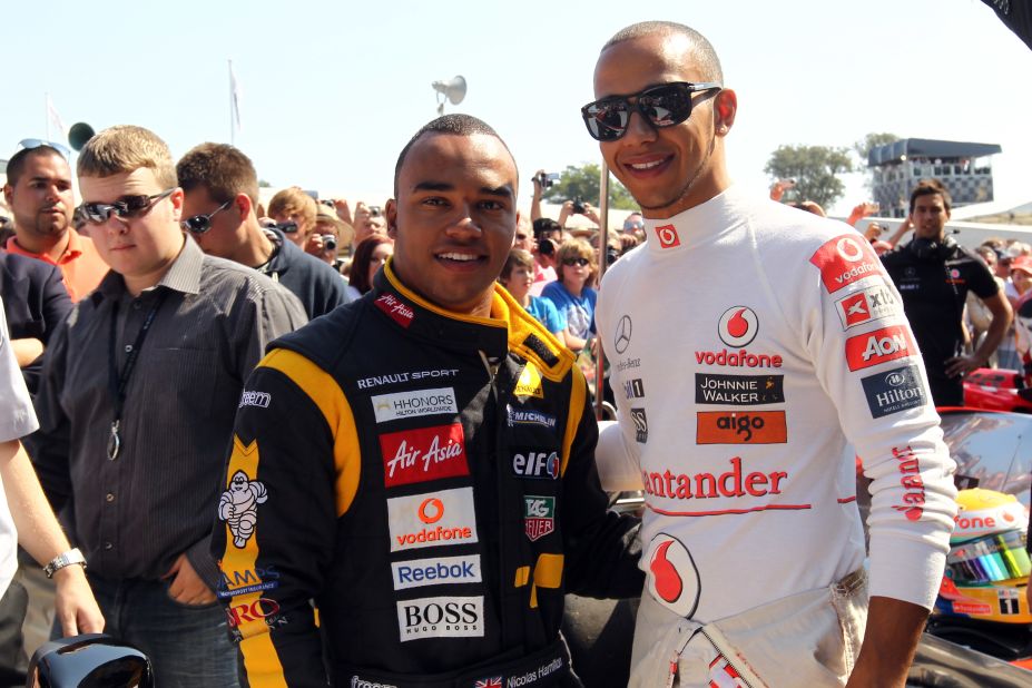 Hamilton pictured in 2011 with his half brother, six-time F1 World Champion Lewis Hamilton.