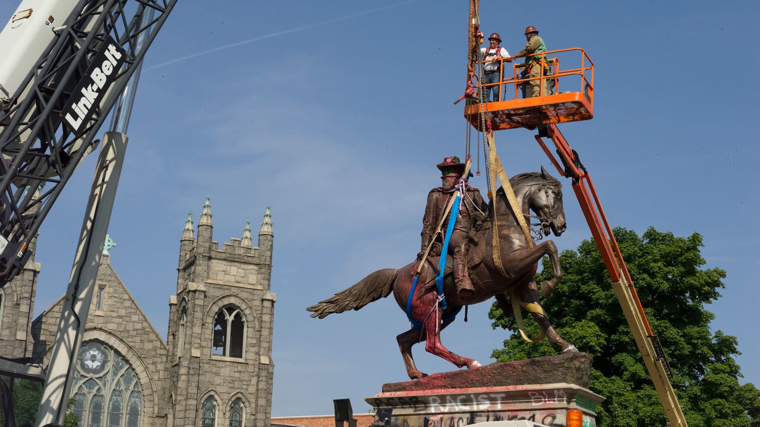 A construction crew takes down the statue of Confederate Calvary General JEB Stuart, along Monument Avenue on July 7, 2020 in Richmond, Virginia. The Andrew W. Mellon Foundation on Wednesday announced it is dedicating $250 million over the next five years to help "transform the way our country's histories are told in public spaces."