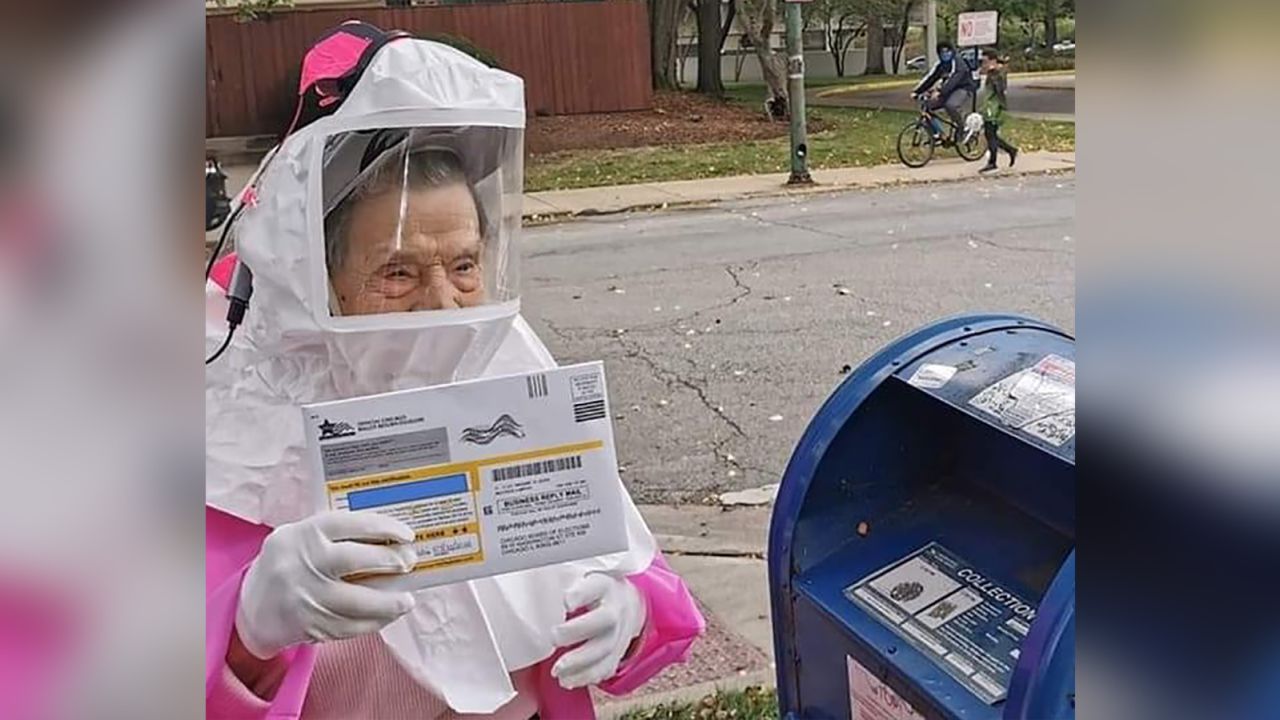Bea Lumpkin, 102, cast her vote in the 2020 election by mail, decked out in personal protective equipment. She told CNN this election is one of the most critical of her lifetime. 