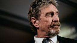 John McAfee, founder of McAfee Associates Inc. and chief cybersecurity visionary at MGT Capital Investments Inc., listens during a Bloomberg Television interview on the sidelines of the Shape the Future: Blockchain Global Summit in Hong Kong, China, on Wednesday, Sept. 20, 2017. McAfee, who now runs a bitcoin mining company, says China's banning of initial coin offerings won't halt the momentum of cryptocurrencies globally. Photographer: Anthony Kwan/Bloomberg via Getty Images