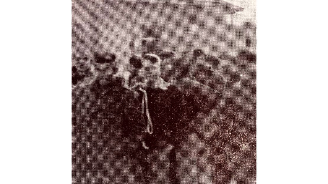 Liberated POWs preparing to depart Luft Stalag VII A for Camp Lucky Strike on May 10, 1945. Frank Murphy standing third from the left with white drawstring over shoulder. 