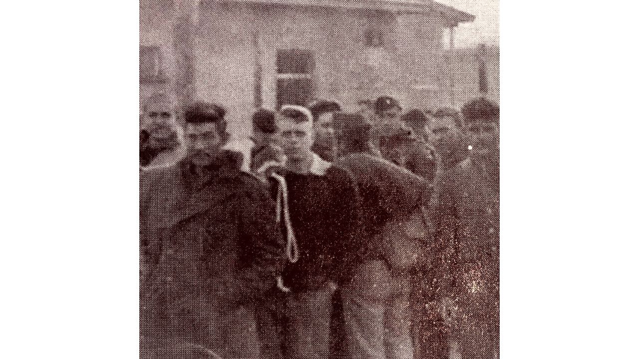 Liberated POWs preparing to depart Luft Stalag VII A for Camp Lucky Strike on May 10, 1945. Frank Murphy standing third from the left with white drawstring over shoulder. 