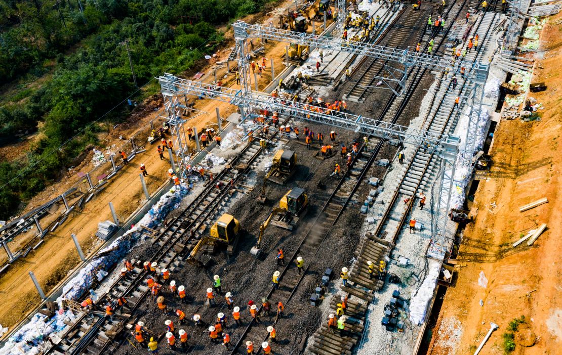 An aerial view from September 2019 of constructors finishing Haolebaoji-Ji'an Railway, a railway aiming at delivering coal from its mine to the market, in Jiangxi province.