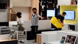 Customers shop at the newly opened IKEA City store in Mozaika shopping mall, in Moscow, Russia on July 2, 2020. (Photo by Alexey Filippov/Sputnik/AP)