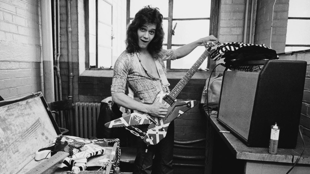 Eddie Van Halen  poses backstage at Lewisham Odeon in London in 1978.