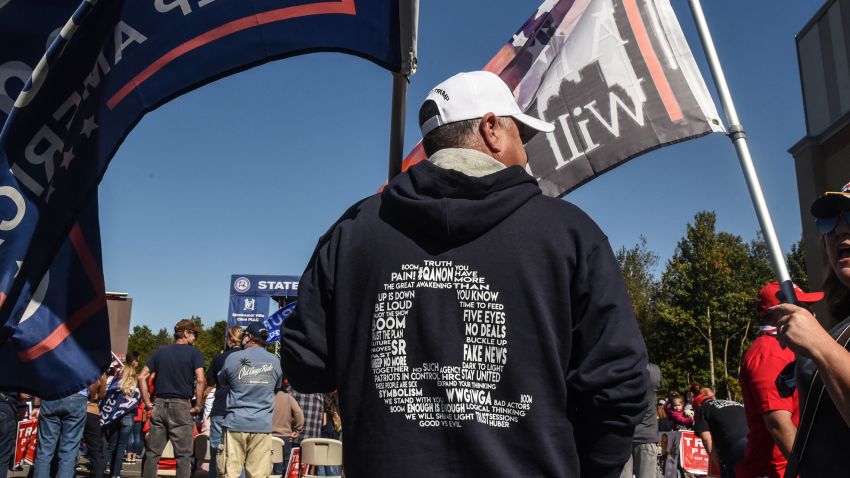 NEW YORK, NY - OCTOBER 03: A person wears a QAnon sweatshirt during a pro-Trump rally on October 3, 2020 in the borough of Staten Island in New York City. The event, which was organized weeks ago, encouraged people to vote Republican and to pray for the health of President Trump who fell ill with Covid-19. (Photo by Stephanie Keith/Getty Images)
