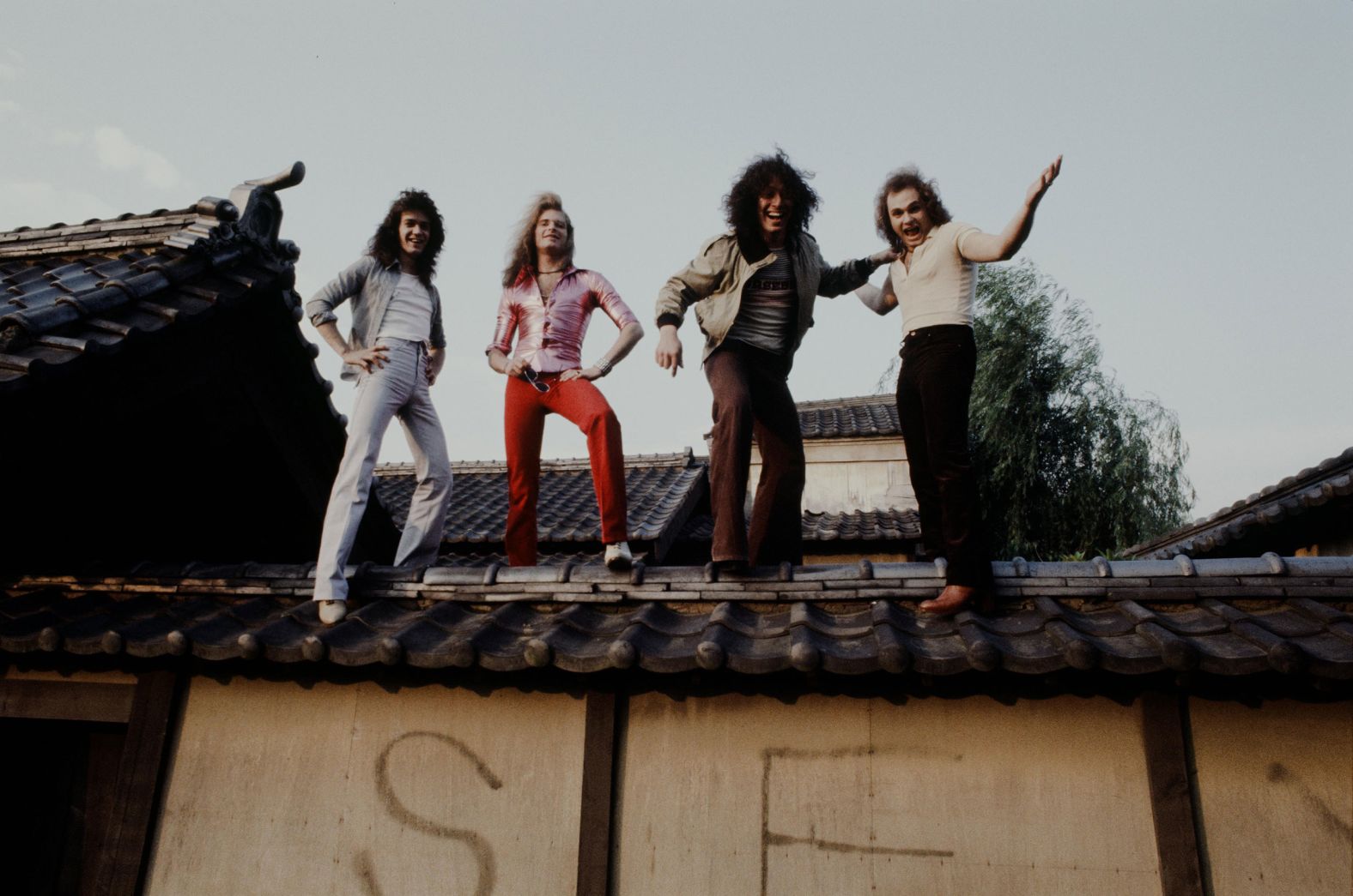 The band poses for a photo on a wall in Kyoto in June 1978.
