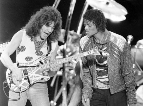 Van Halen performs "Beat It" with Michael Jackson during Jackson's Victory Tour in Irving, Texas. Van Halen famously lent his guitar chops to the song, a smash 1983 hit from the landmark "Thriller" album.