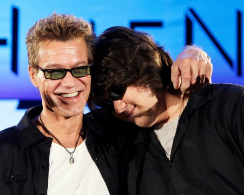Van Halen, left, hugs his son, Wolfgang, after announcing the band's North American tour in Los Angeles on August 13, 2007.