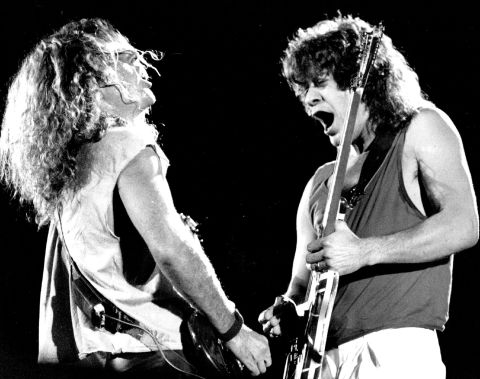 Hagar and Van Halen perform on guitars during the closing night of Monsters of Rock Tour 1988, an annual hard rock and heavy metal music festival, in Denver. They closed out the evening at Mile High Stadium to a crowd of nearly 50,000.