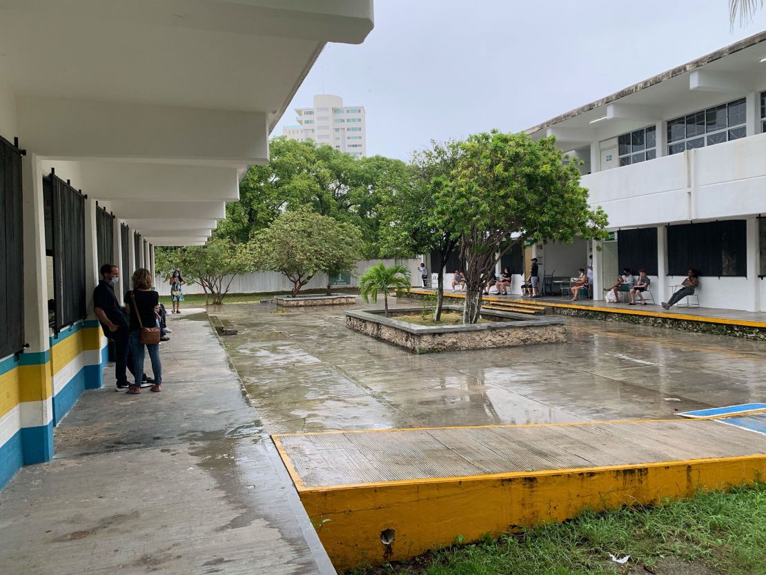 Hotel guests await the impending hurricane at a shelter in Cancun.