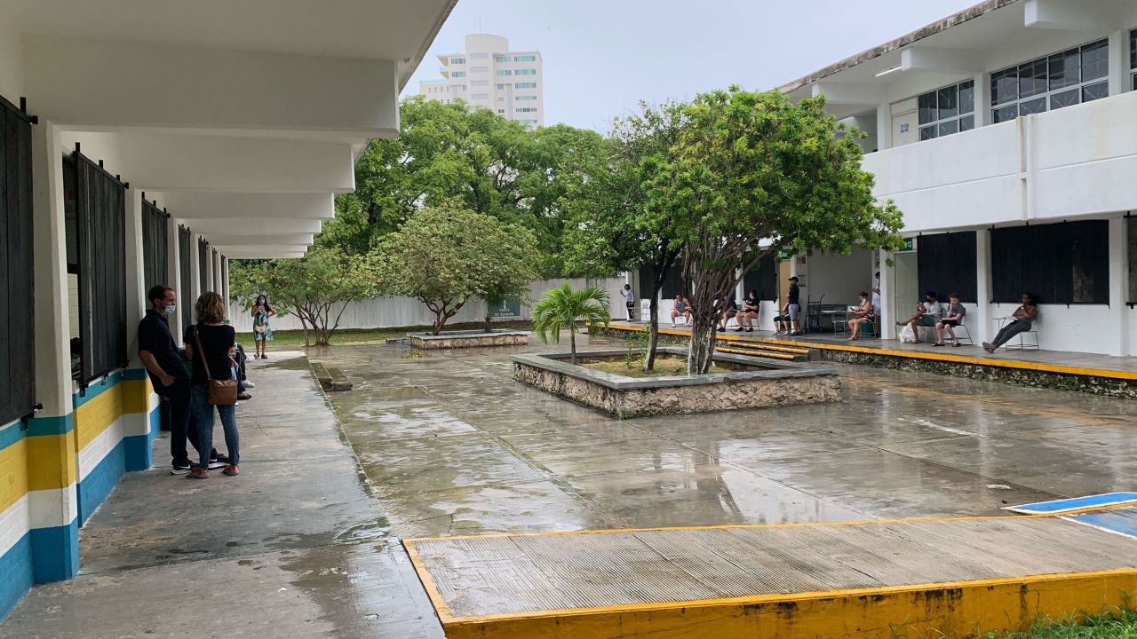 Hotel guests await the impending hurricane at a shelter in Cancun.