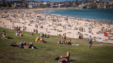 People visit Bondi beach in Sydney on October 5, 2020.