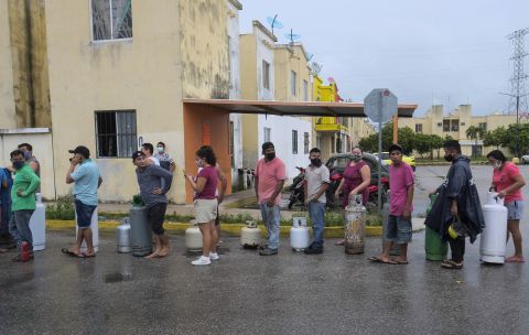 People line up to buy gas before the arrival of Hurricane Delta in Cancun, Mexico, on October 6.