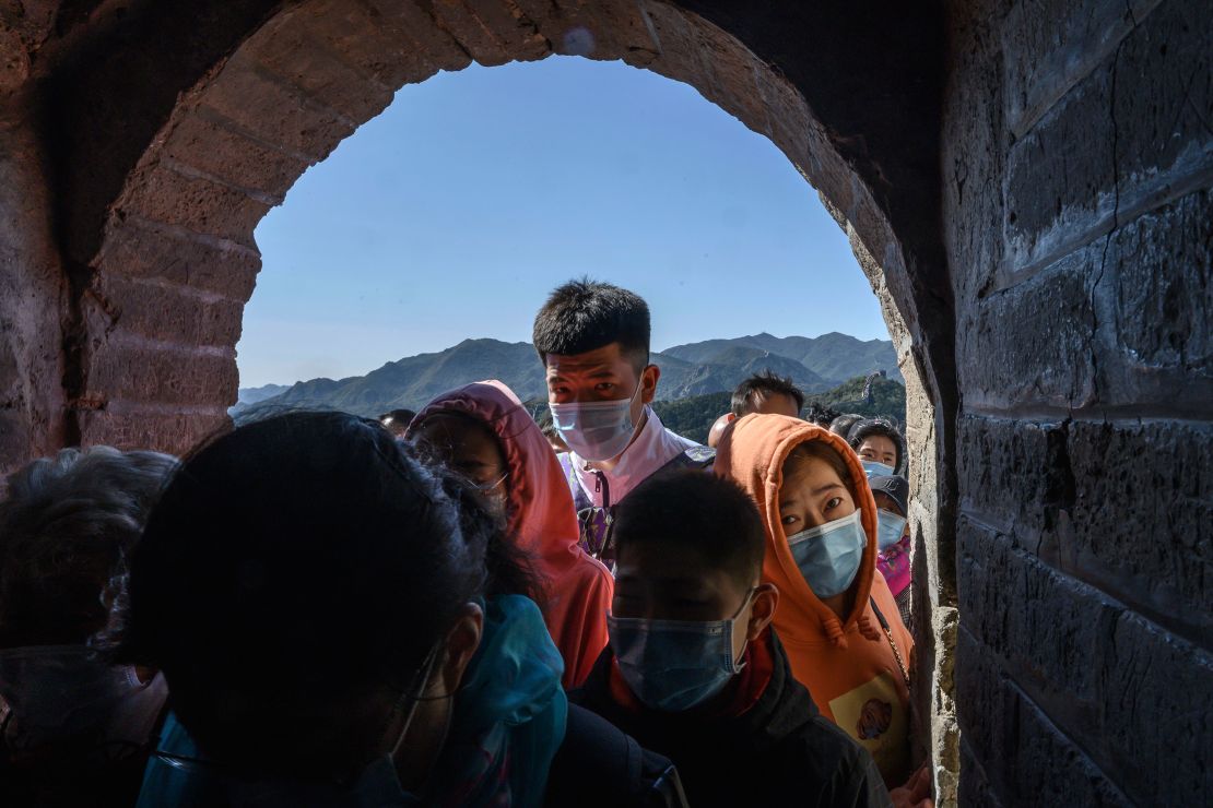 Chinese tourists crowd in a doorway on a section of the Great Wall on October 4.