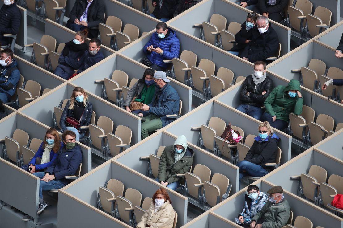 Spectators watch Nadal in action.