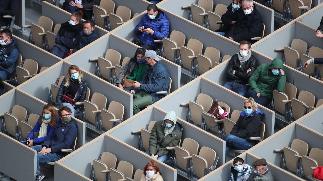 Spectators watch Nadal in action.